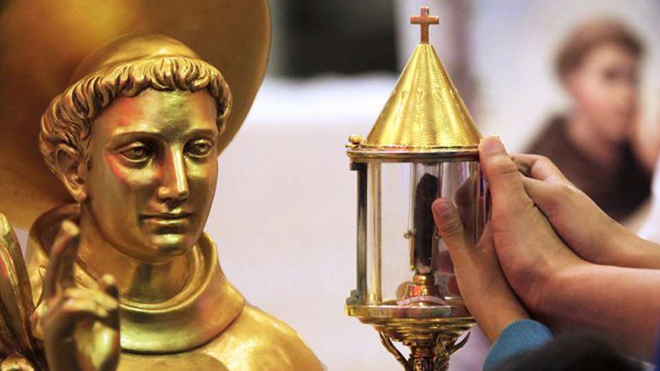 People worshipping St Anthony's tongue